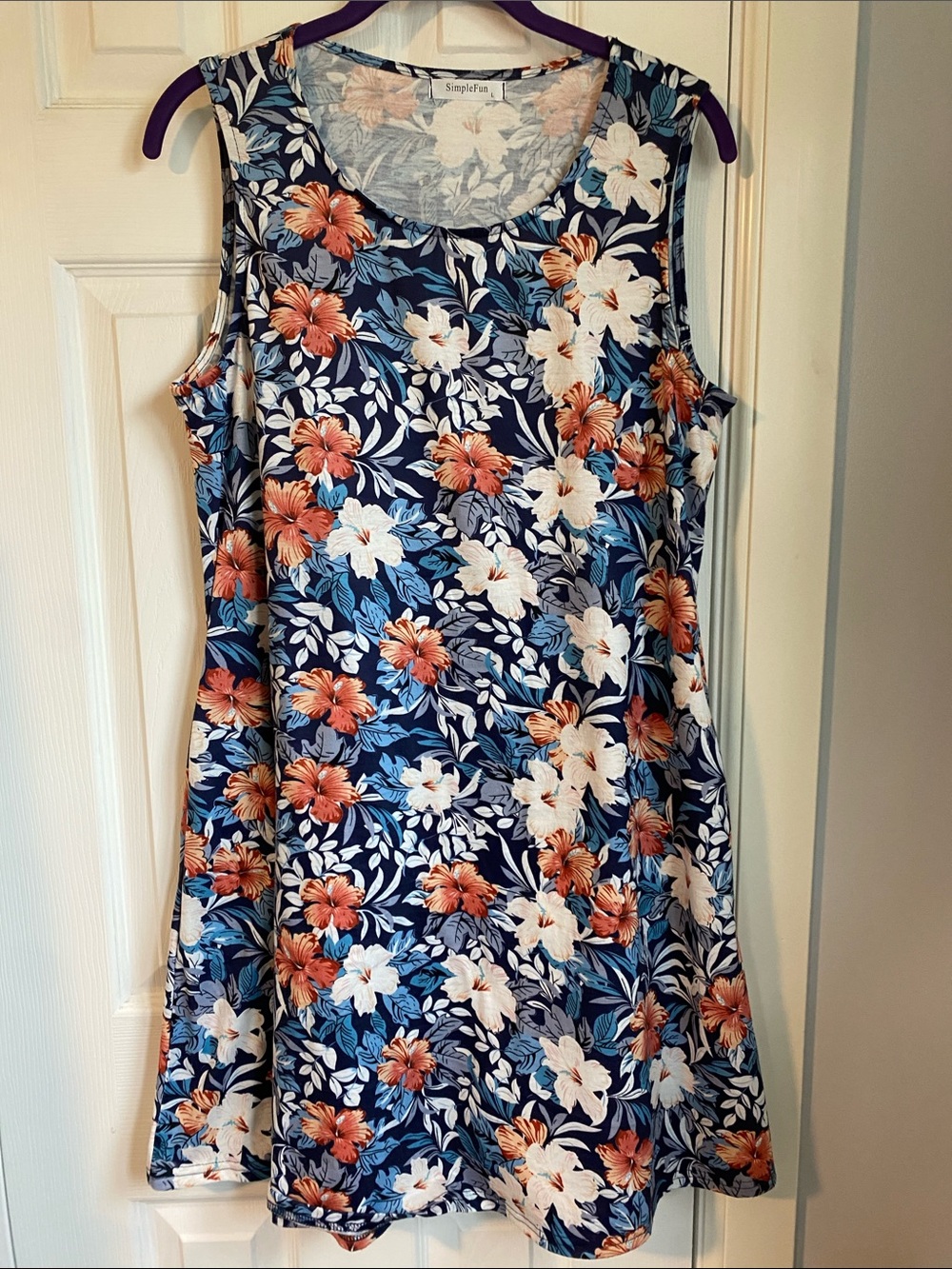 Navy Sleeveless Floral Swing Dress with Coral & White Blooms
